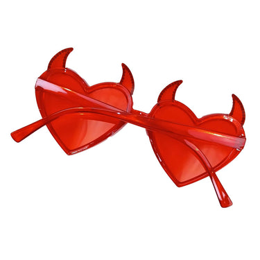 a pair of heart shaped glasses with horns on them